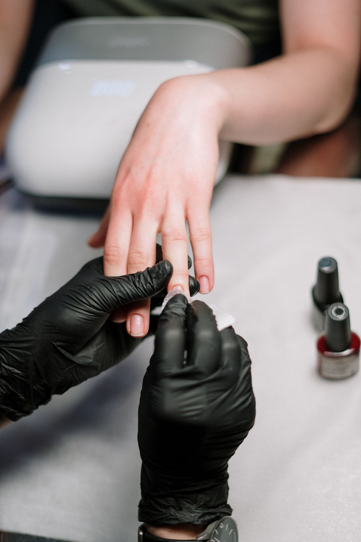 Manicure in progress at Luxe Nails